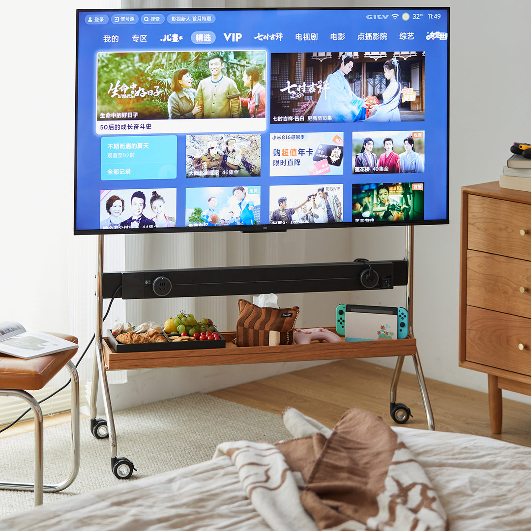 Scandinavian cherry wood tv hanger hal in still life.