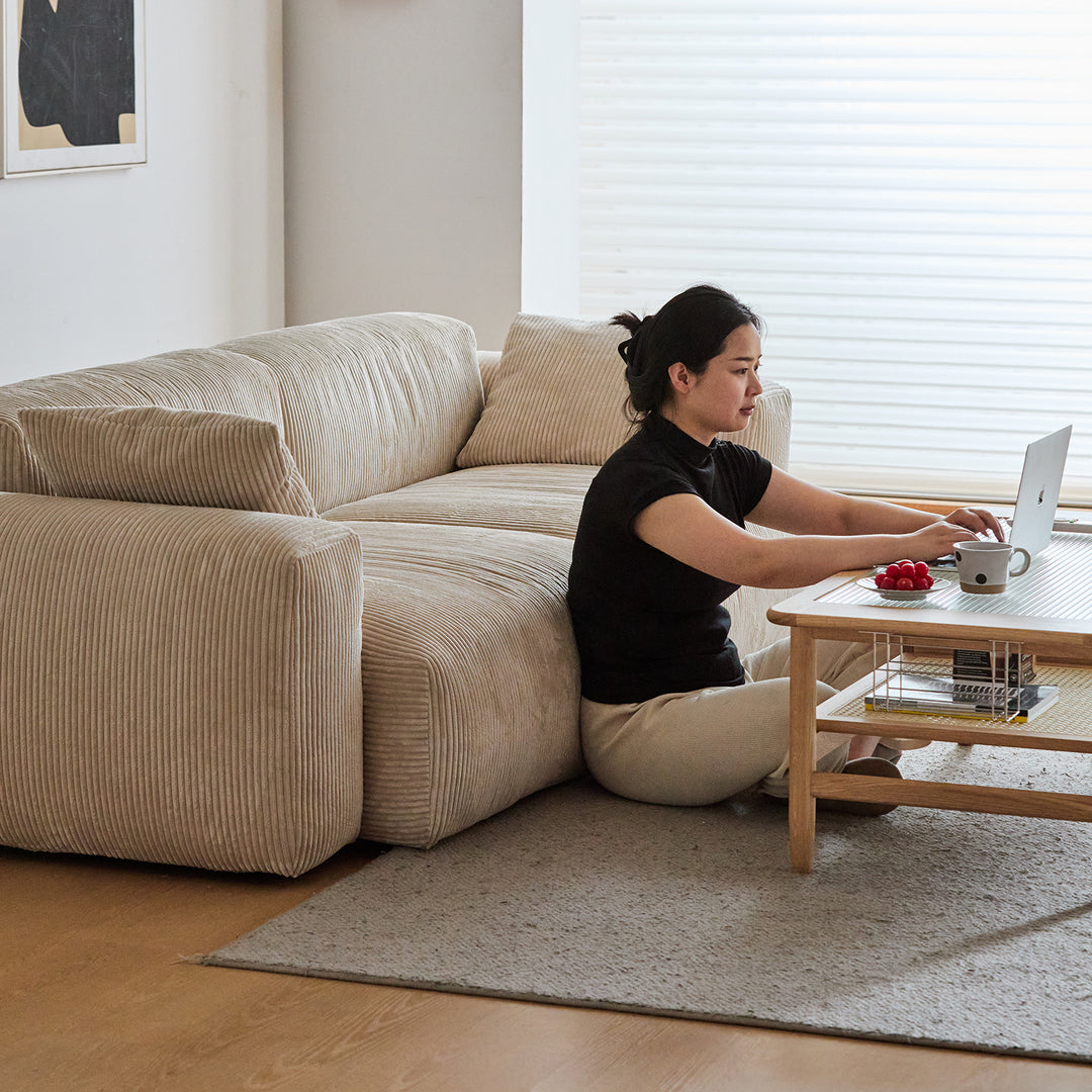 Scandinavian corduroy velvet fabric 1 seater sofa square in still life.