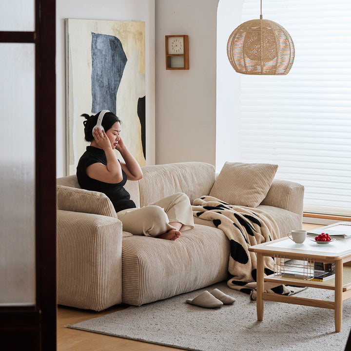 Scandinavian corduroy velvet fabric 1 seater sofa square with context.