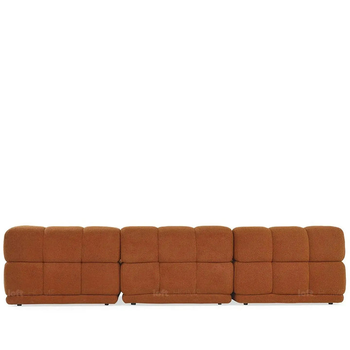 Contemporary teddy fabric modular 4 seater sofa cuboid in still life.