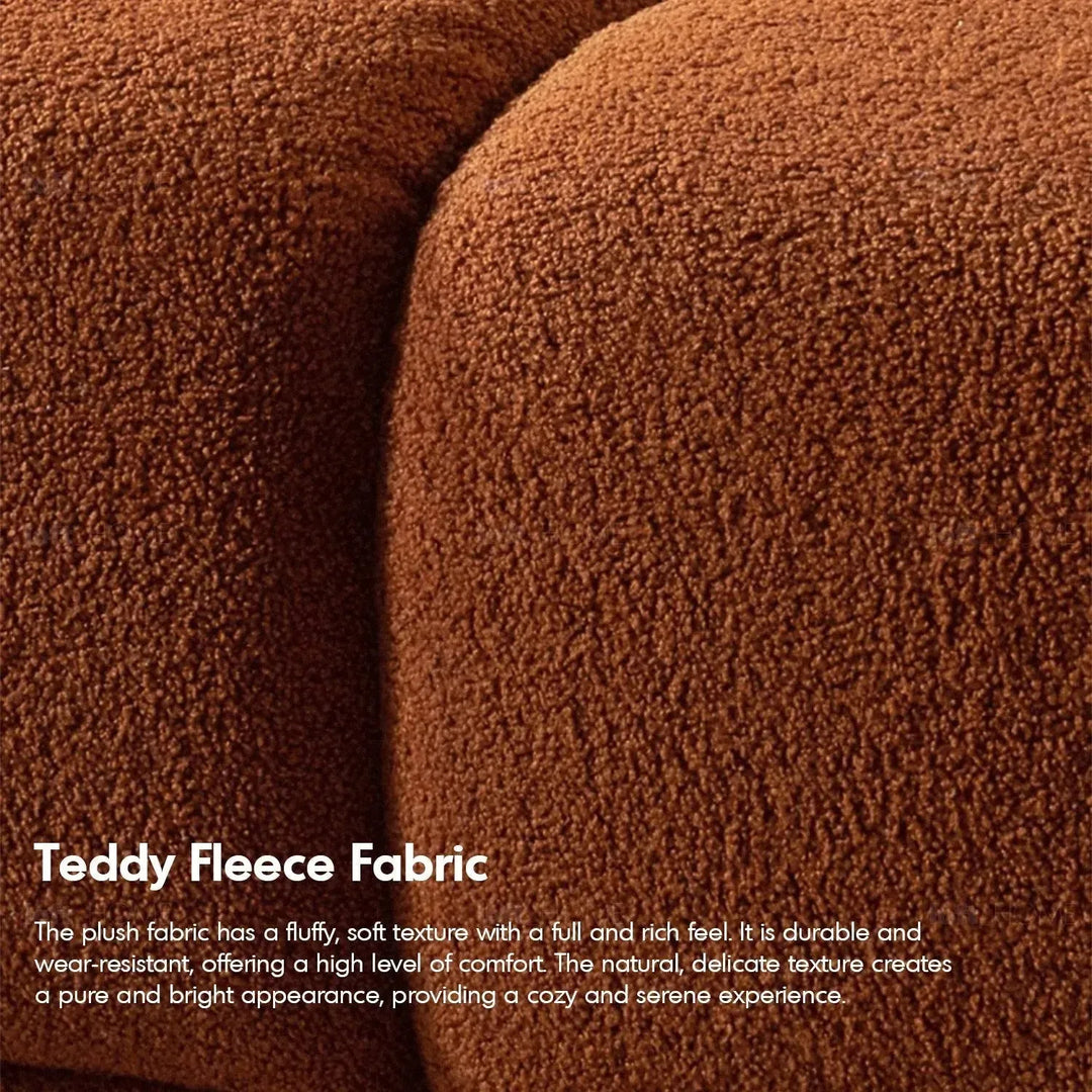 Contemporary teddy fabric modular 4 seater sofa cuboid in details.
