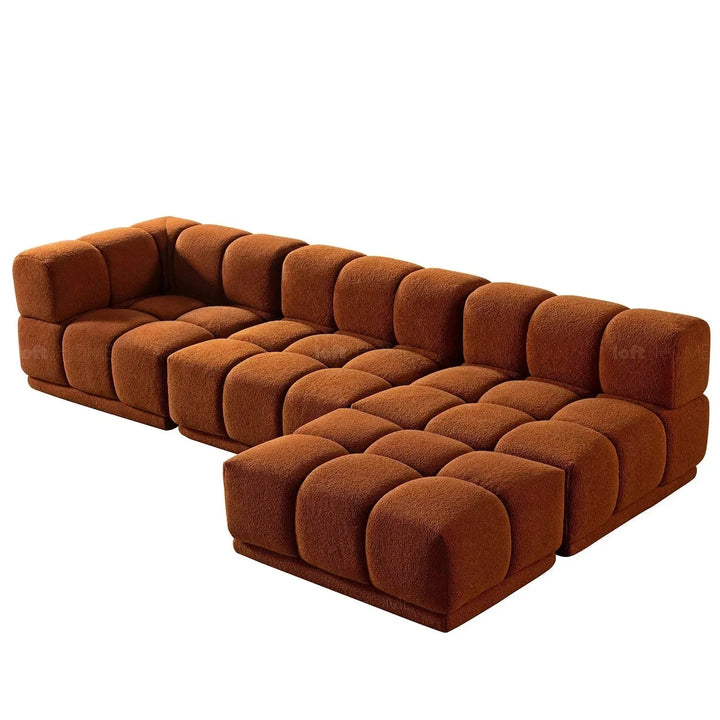Contemporary teddy fabric modular ottoman cuboid in still life.