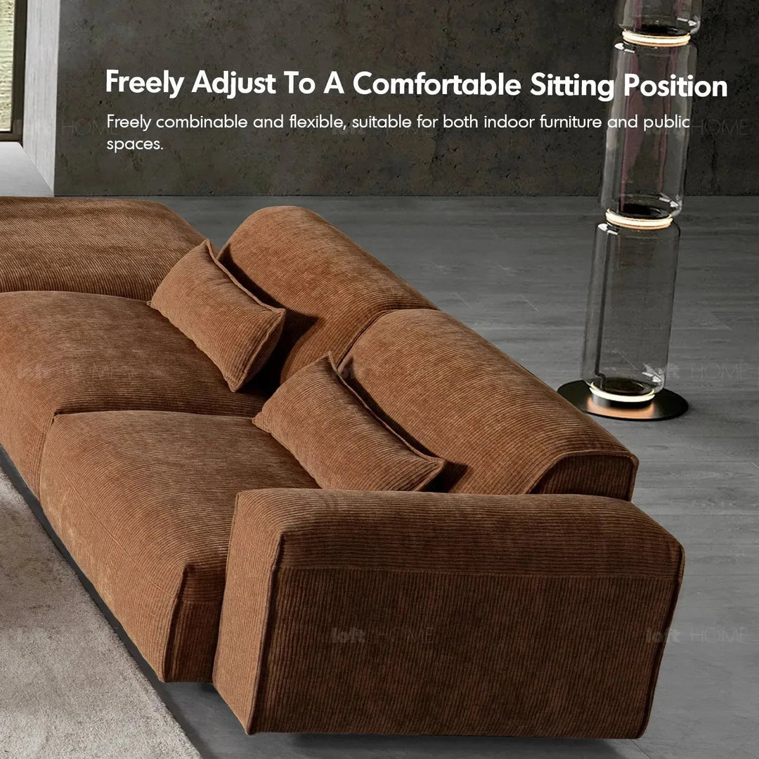Modern corduroy velvet fabric modular ottoman opera with context.