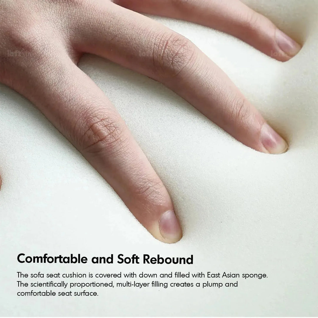 Modern corduroy velvet fabric modular ottoman opera in panoramic view.