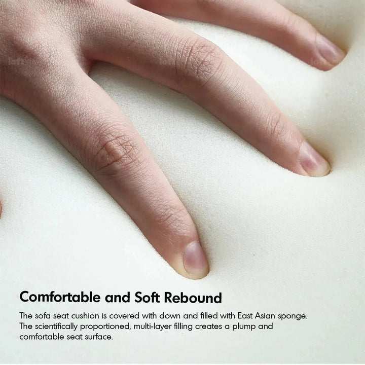 Modern corduroy velvet fabric modular ottoman opera in panoramic view.