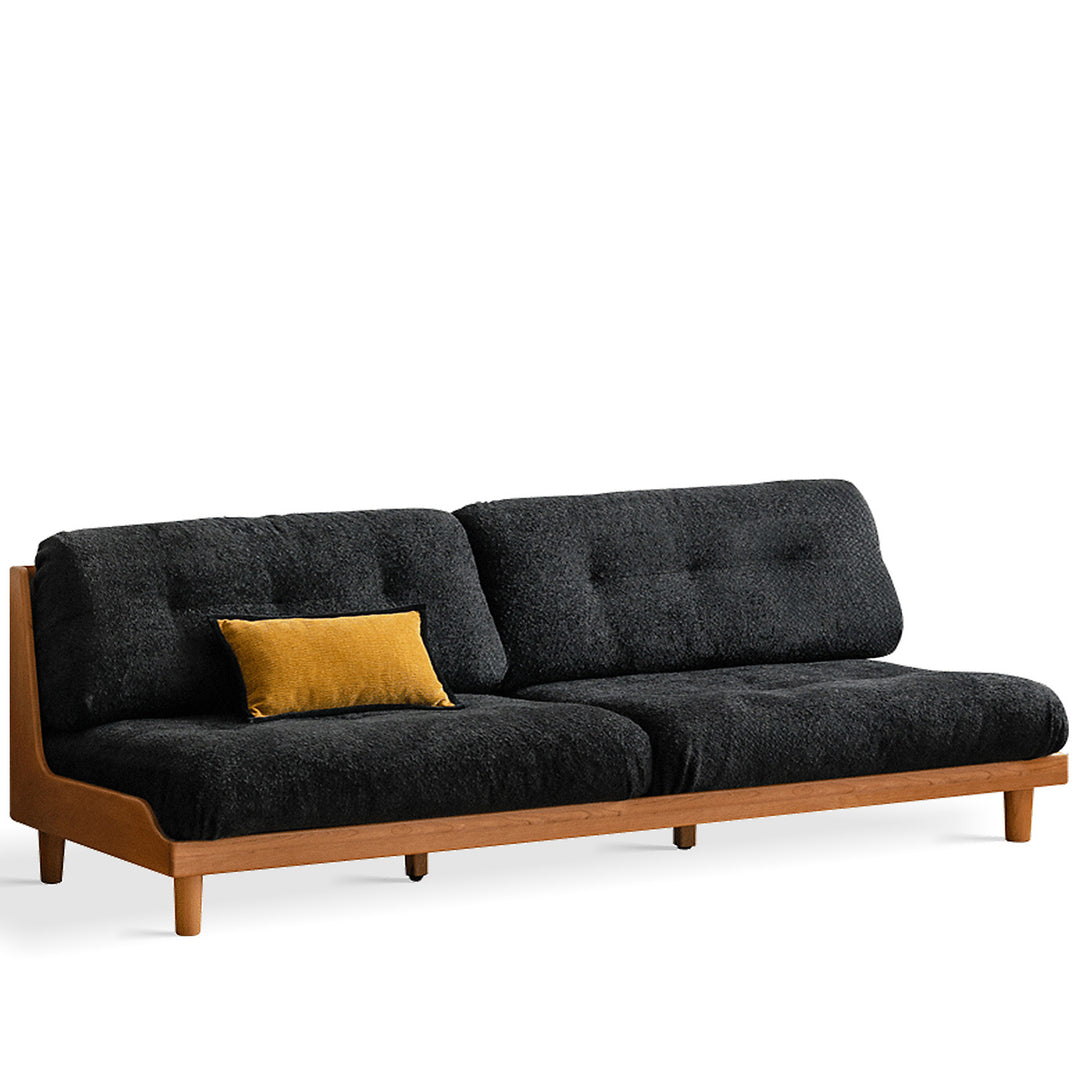 Scandinavian mixed weave fabric cherry wood 3 seater sofa undermoon in panoramic view.