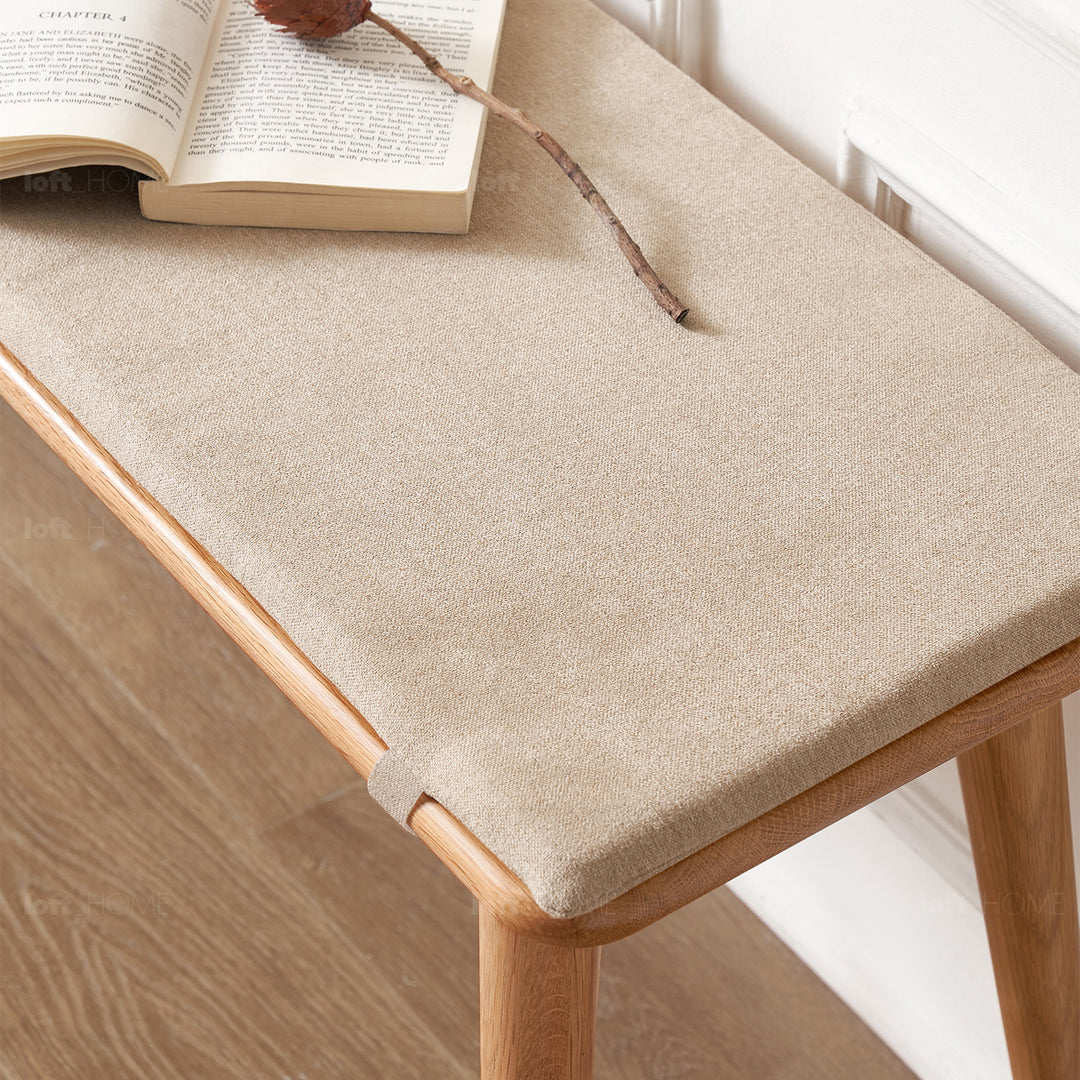 Scandinavian oak wood dining bench with cushion sereno with context.