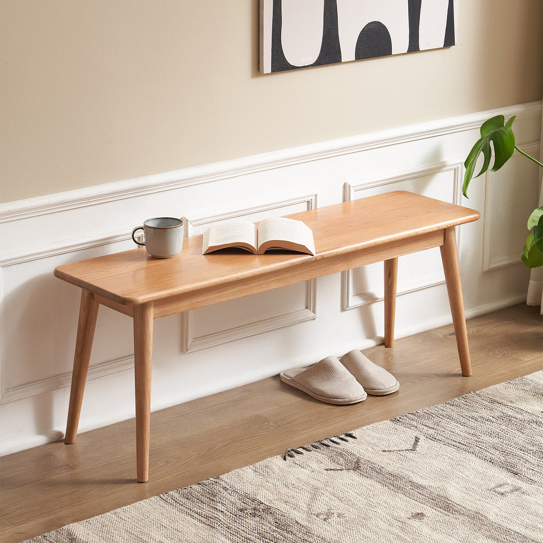 Scandinavian oak wood dining bench with cushion sereno primary product view.