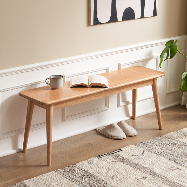 Scandinavian oak wood dining bench with cushion sereno primary product view.