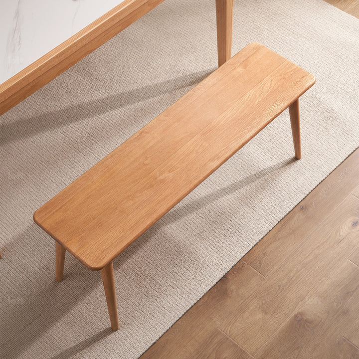 Scandinavian oak wood dining bench with cushion sereno in details.