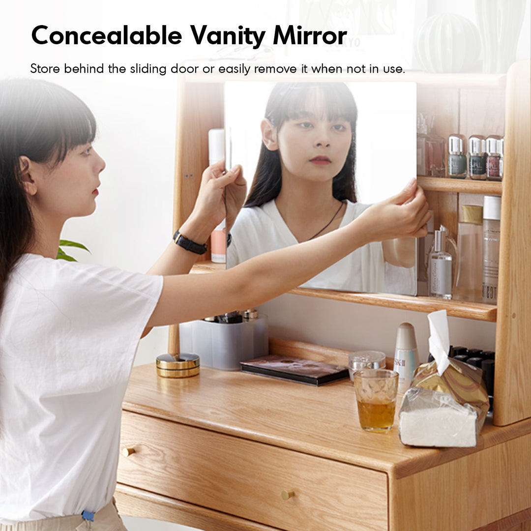 Scandinavian oak wood moru glass dressing table with mirror gleam in still life.