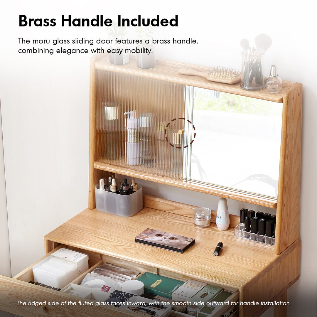 Scandinavian oak wood moru glass dressing table with mirror gleam in close up details.