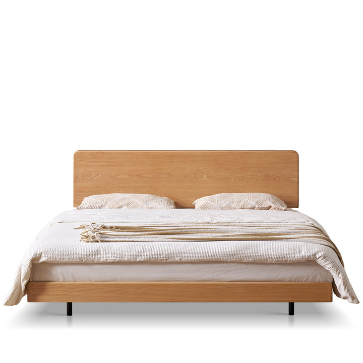 Scandinavian oak wood headboard adjustable floating bed nora in white background.