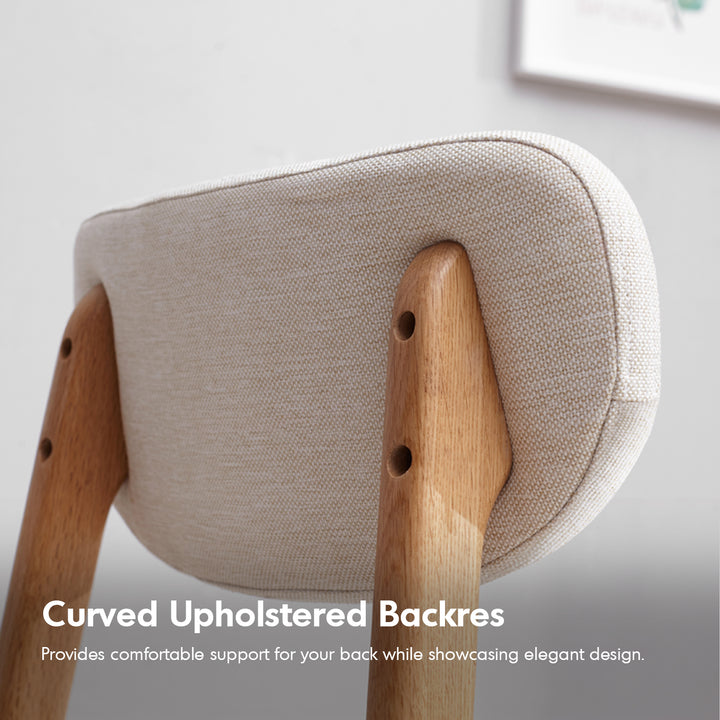 Scandinavian oak wood mixed weave fabric cover removable dining chair nest in panoramic view.