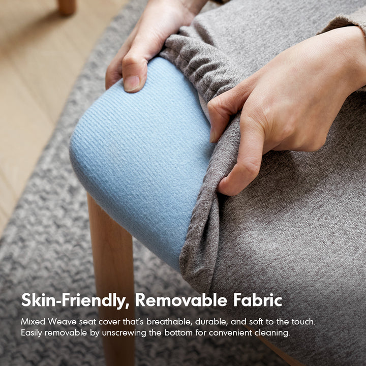 Scandinavian oak wood mixed weave fabric dressing chair loop in close up details.