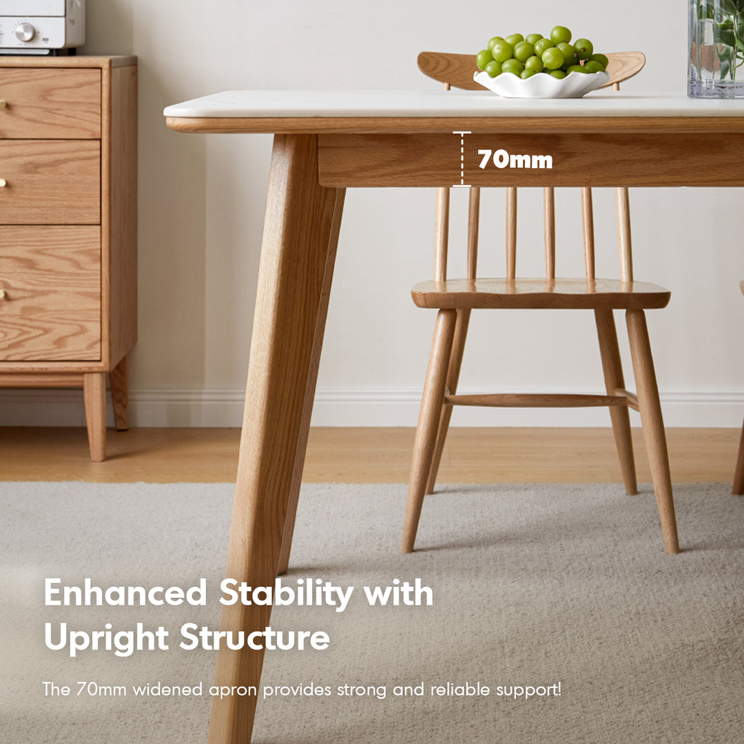 Scandinavian oak wood sintered stone dining table aura in panoramic view.