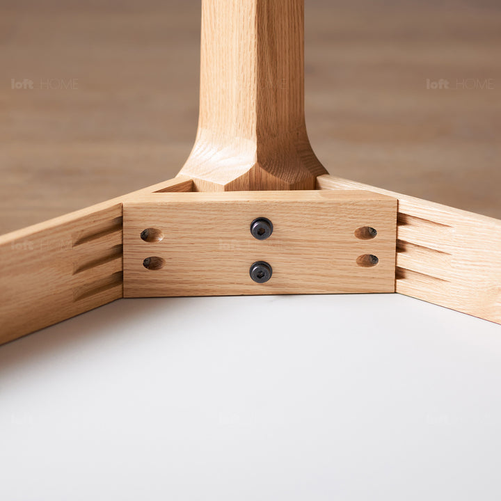 Scandinavian oak wood sintered stone dining table oaklin in still life.