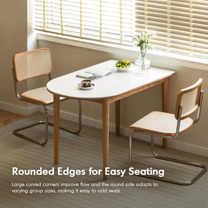 Scandinavian oak wood sintered stone half oval dining table halo in close up details.