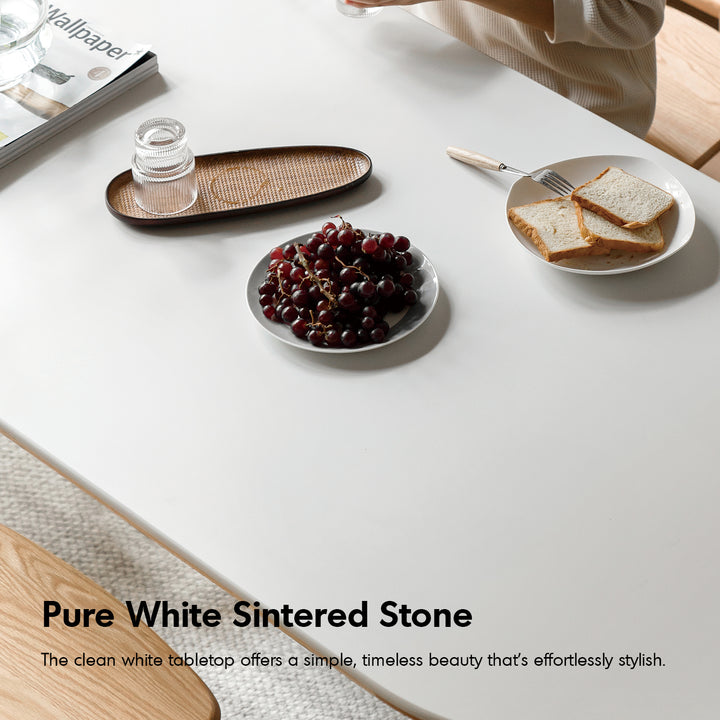 Scandinavian oak wood sintered stone half oval dining table halo in panoramic view.