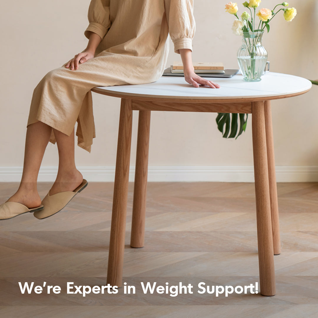 Scandinavian oak wood sintered stone round dining table orb situational feels.