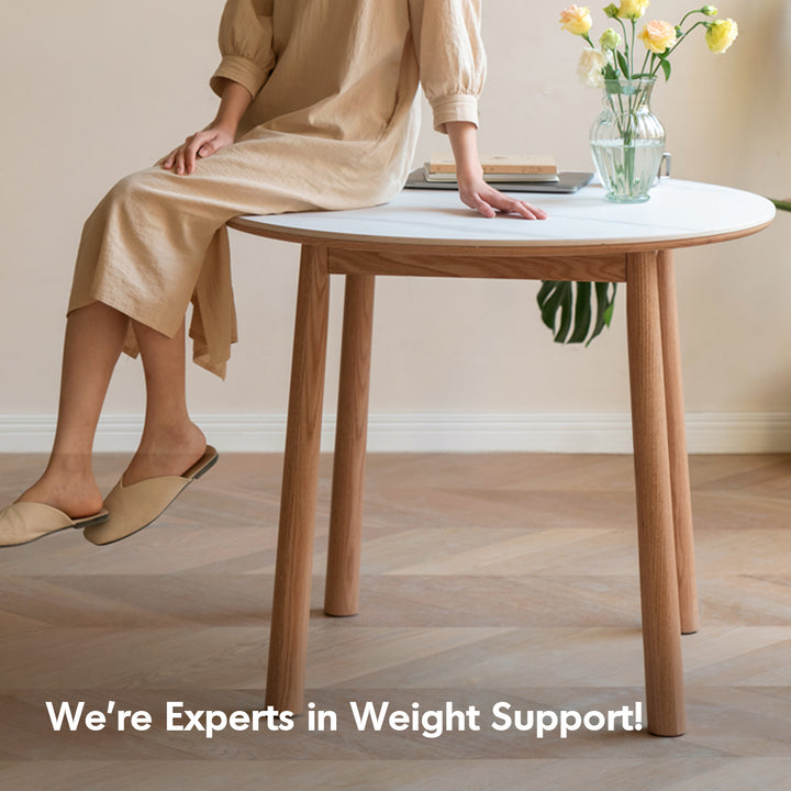 Scandinavian oak wood sintered stone round dining table orb situational feels.