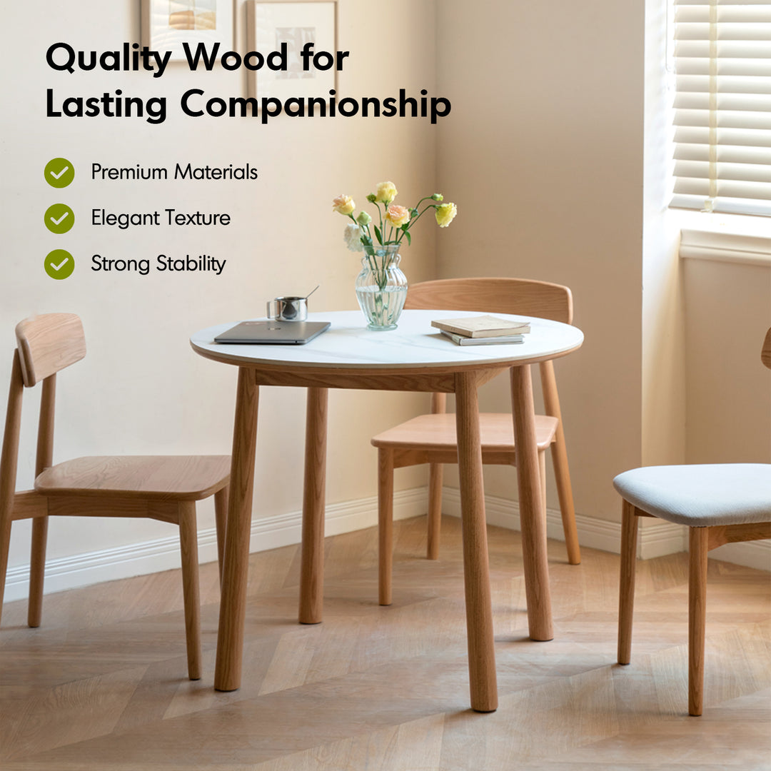 Scandinavian oak wood sintered stone round dining table orb layered structure.