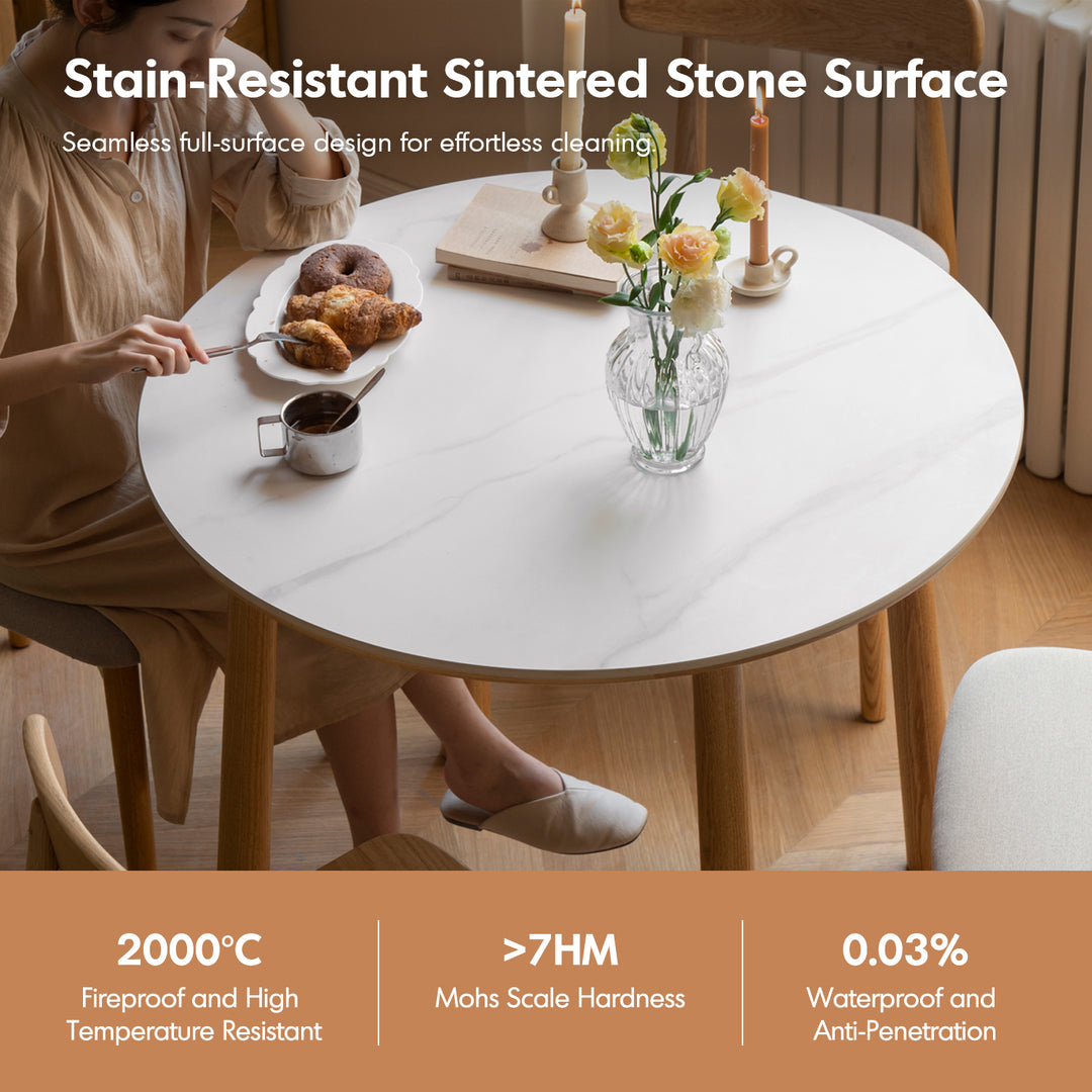 Scandinavian oak wood sintered stone round dining table orb in details.