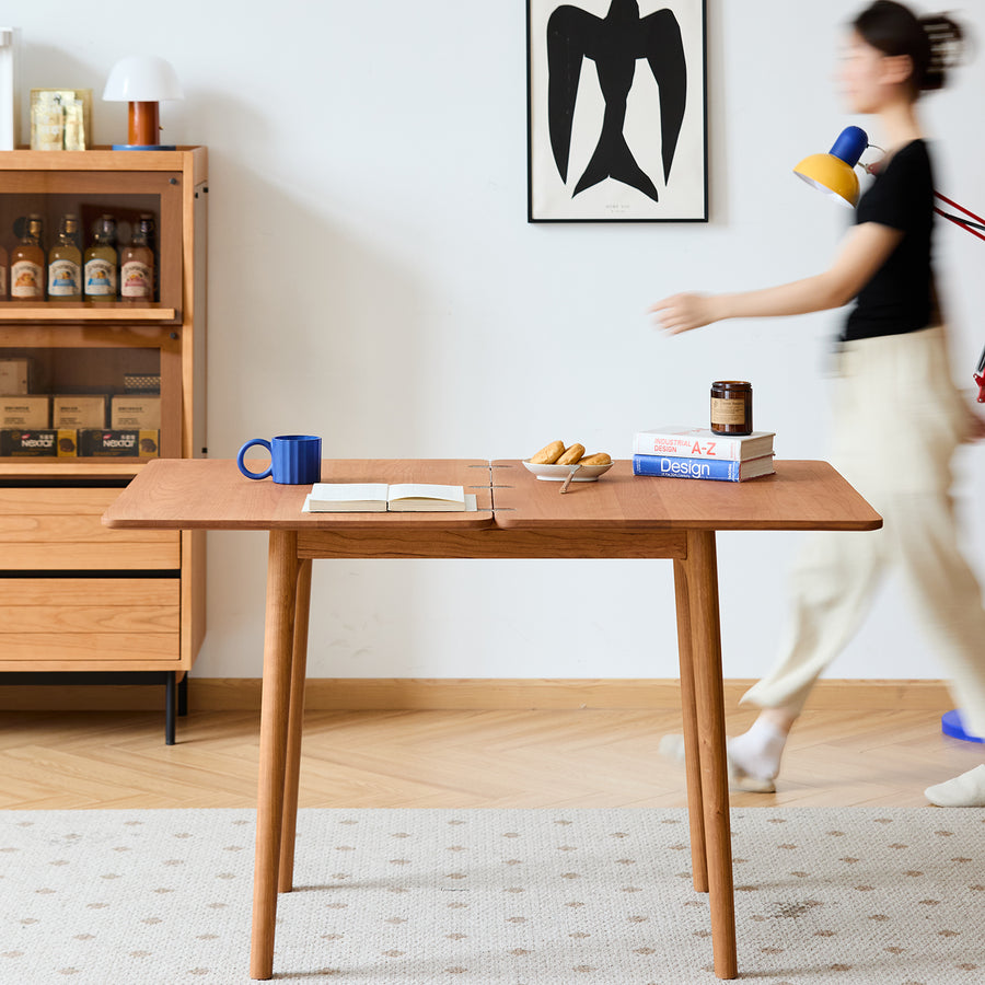 Scandinavian cherry wood dining table forest in close up details.
