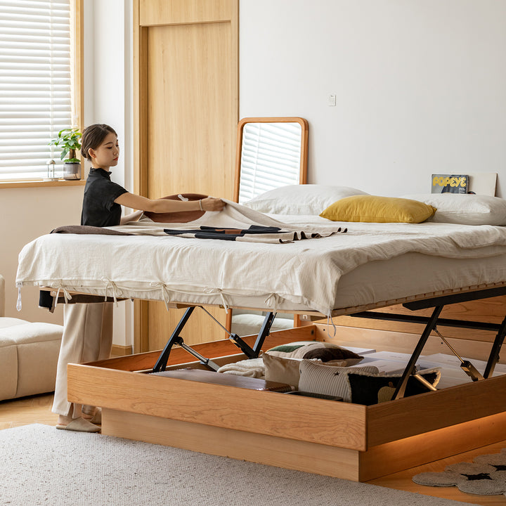 Scandinavian cherry wood electric lift-up storage bed coastal in still life.