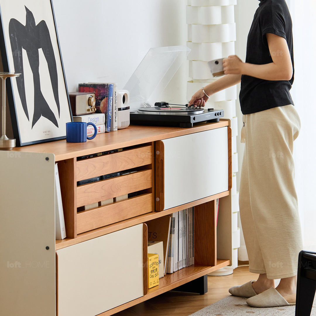 Scandinavian cherry wood side cabinet timeless in close up details.