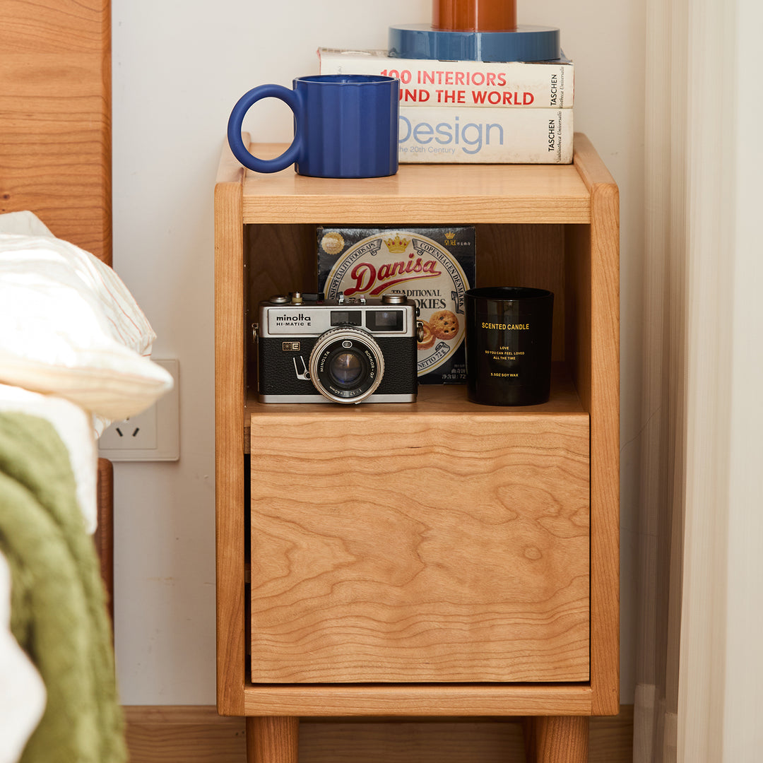Scandinavian cherry wood side table cubo in real life style.