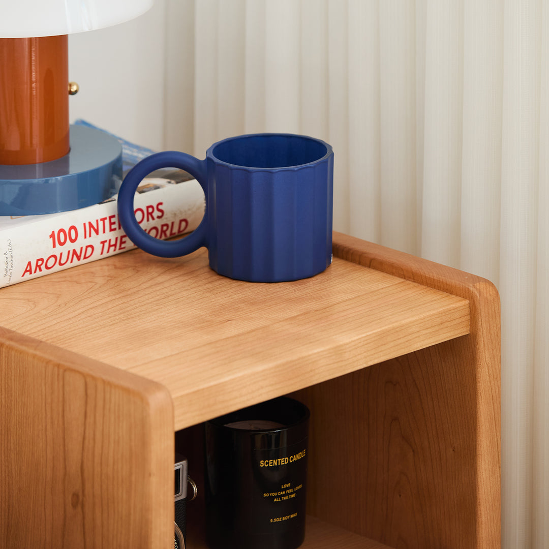 Scandinavian cherry wood side table cubo in details.