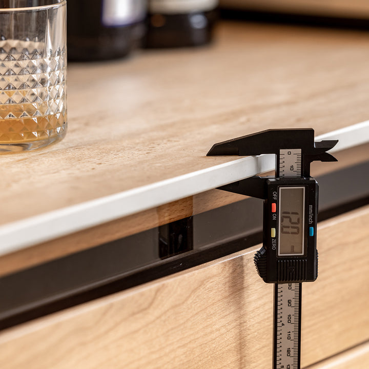 Scandinavian cherry wood sintered stone cabinet timeless with context.