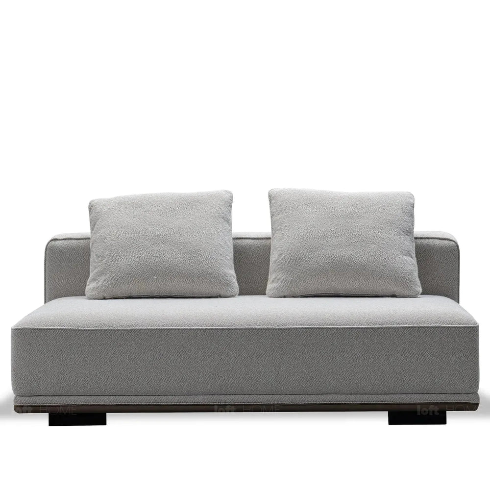 Minimalist mixed weave fabric modular armless 2 seater sofa eleganza in white background.