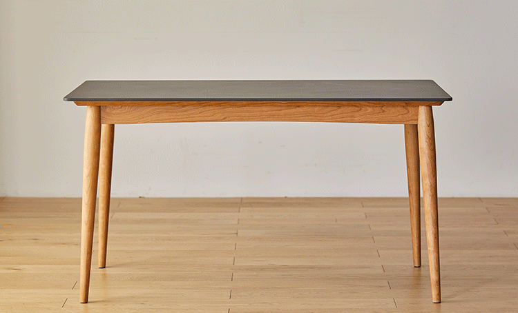 Scandinavian sintered stone dining table green with context.