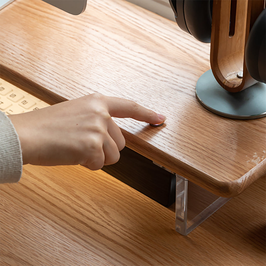 Scandinavian wood desktop monitor stand shelf aeris in close up details.