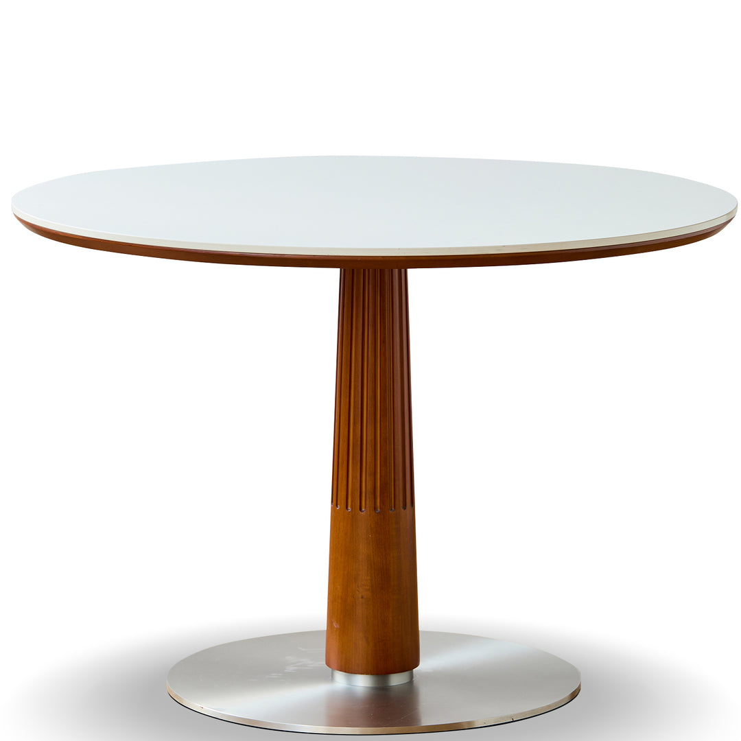 Round table with a wooden pedestal base on a white background