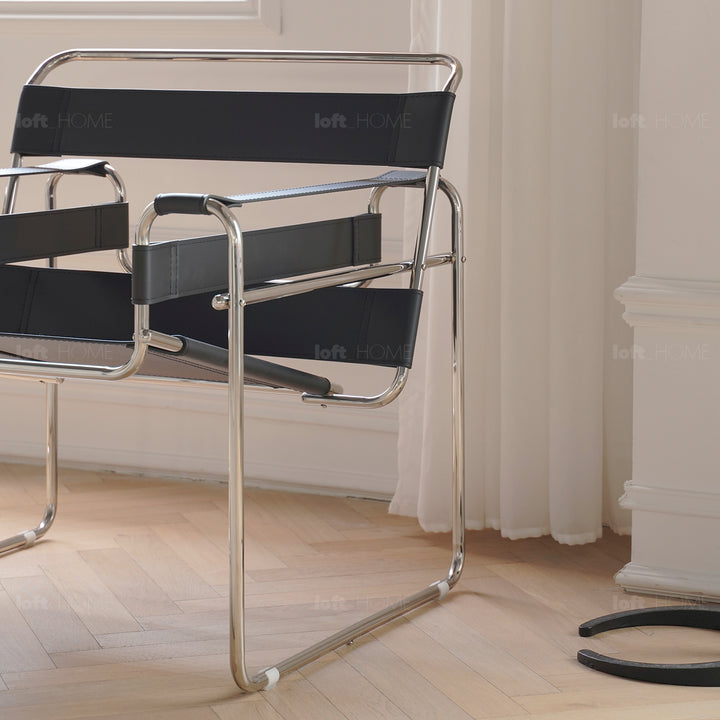 Vintage steel leather sofa chair 1 seater sofa wassily in close up details.