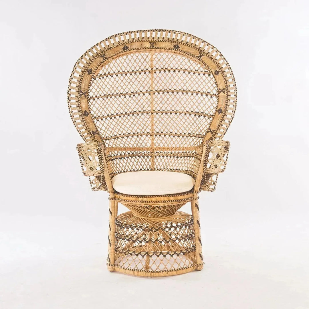 Bohemian rattan 1 seater sofa retro peacock in panoramic view.