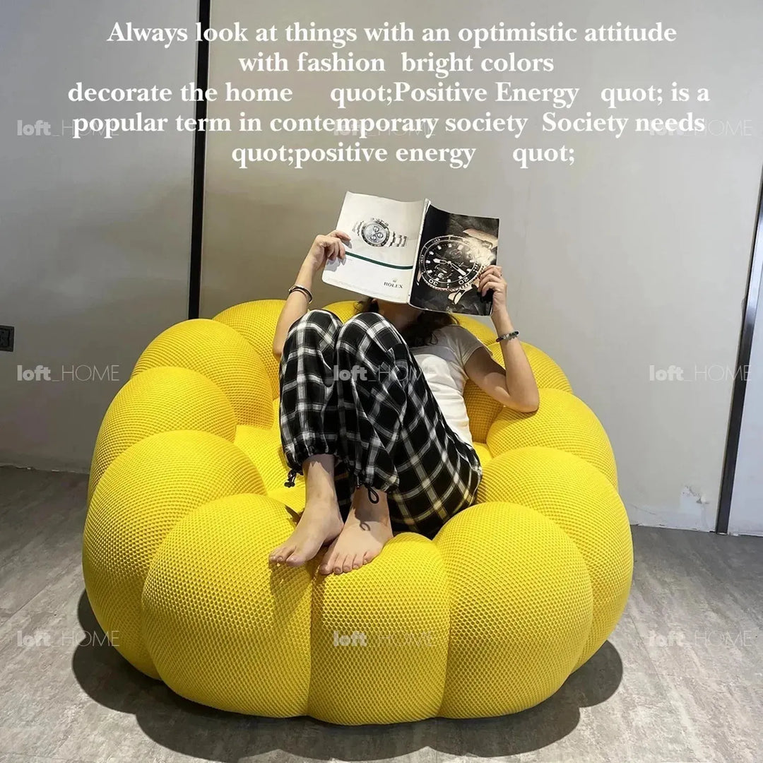 Contemporary fabric 1 seater sofa bubble in still life.