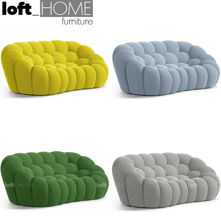 Contemporary fabric 2 seater sofa bubble in still life.