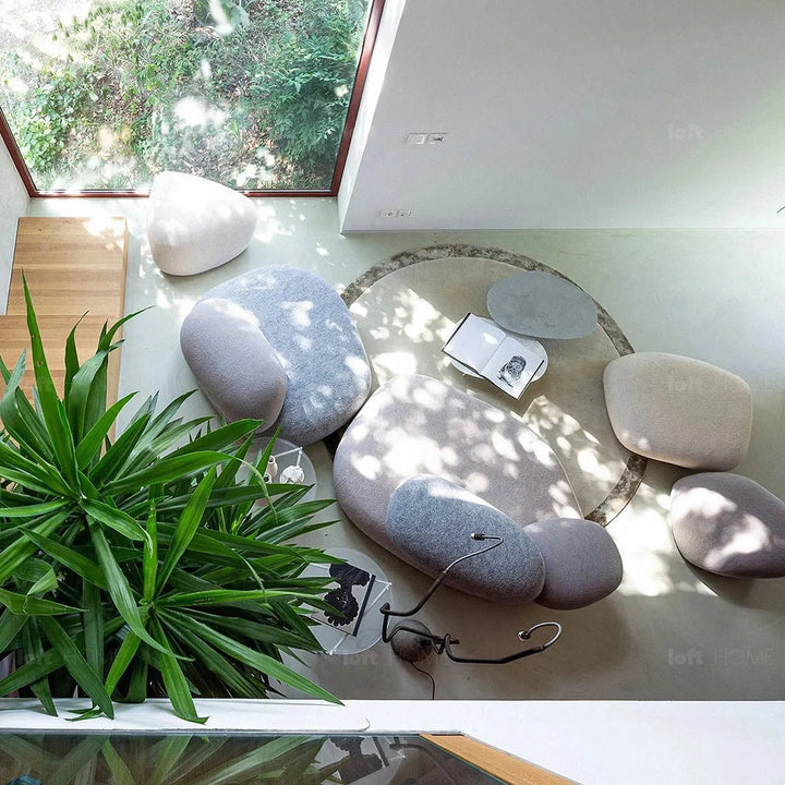 Contemporary fabric 2 seater sofa pebble in close up details.