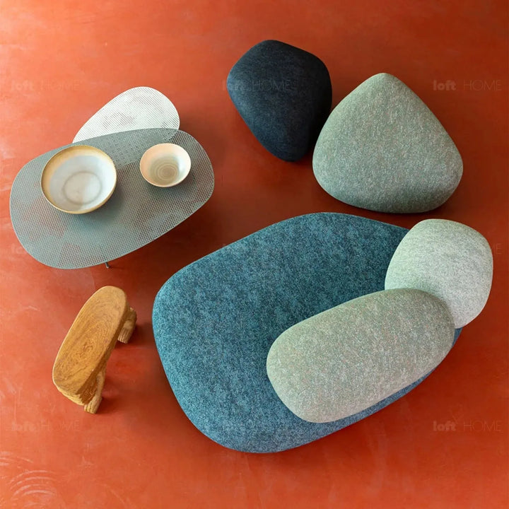 Contemporary fabric 2 seater sofa pebble with context.