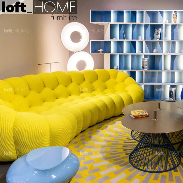 Contemporary fabric 3 seater sofa bubble in still life.