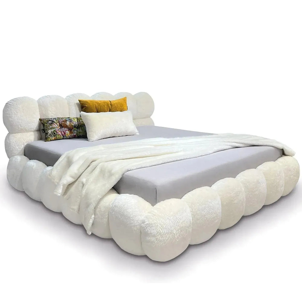 Cream fabric bed pannacotta in white background.