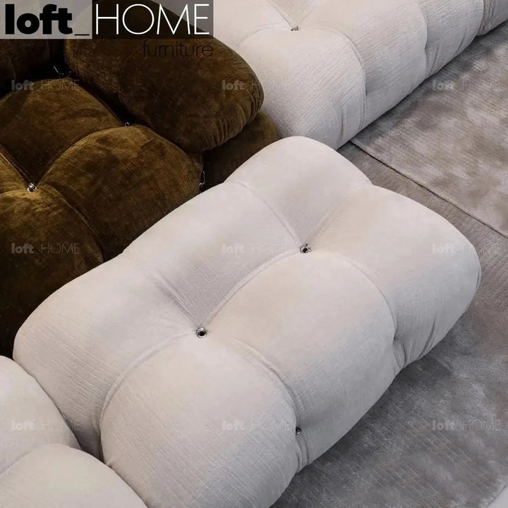 Contemporary fabric ottoman camaleonda environmental situation.