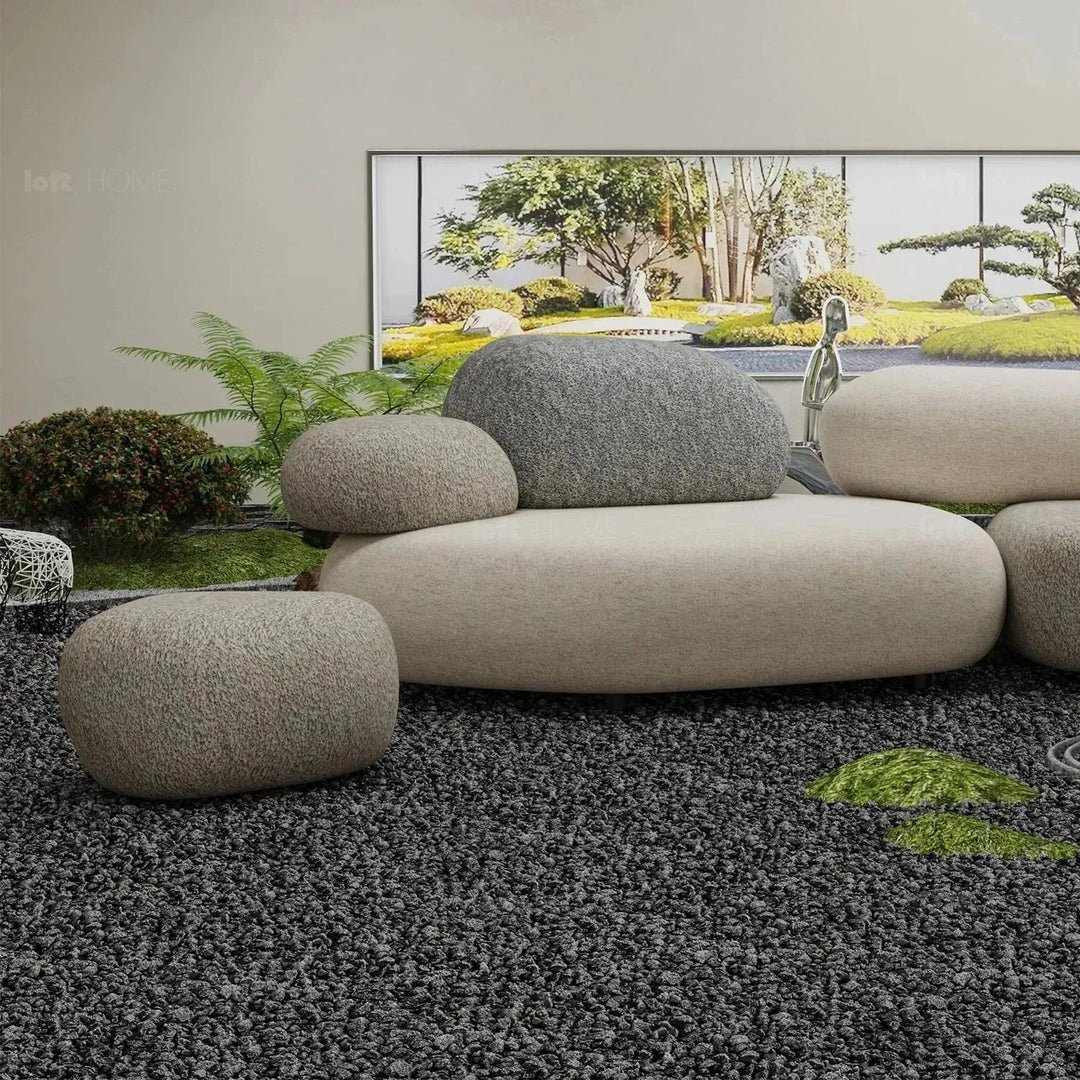 Contemporary fabric ottoman pebble conceptual design.