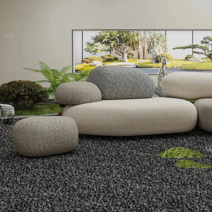 Contemporary fabric ottoman pebble conceptual design.