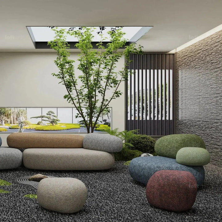 Contemporary fabric ottoman pebble environmental situation.