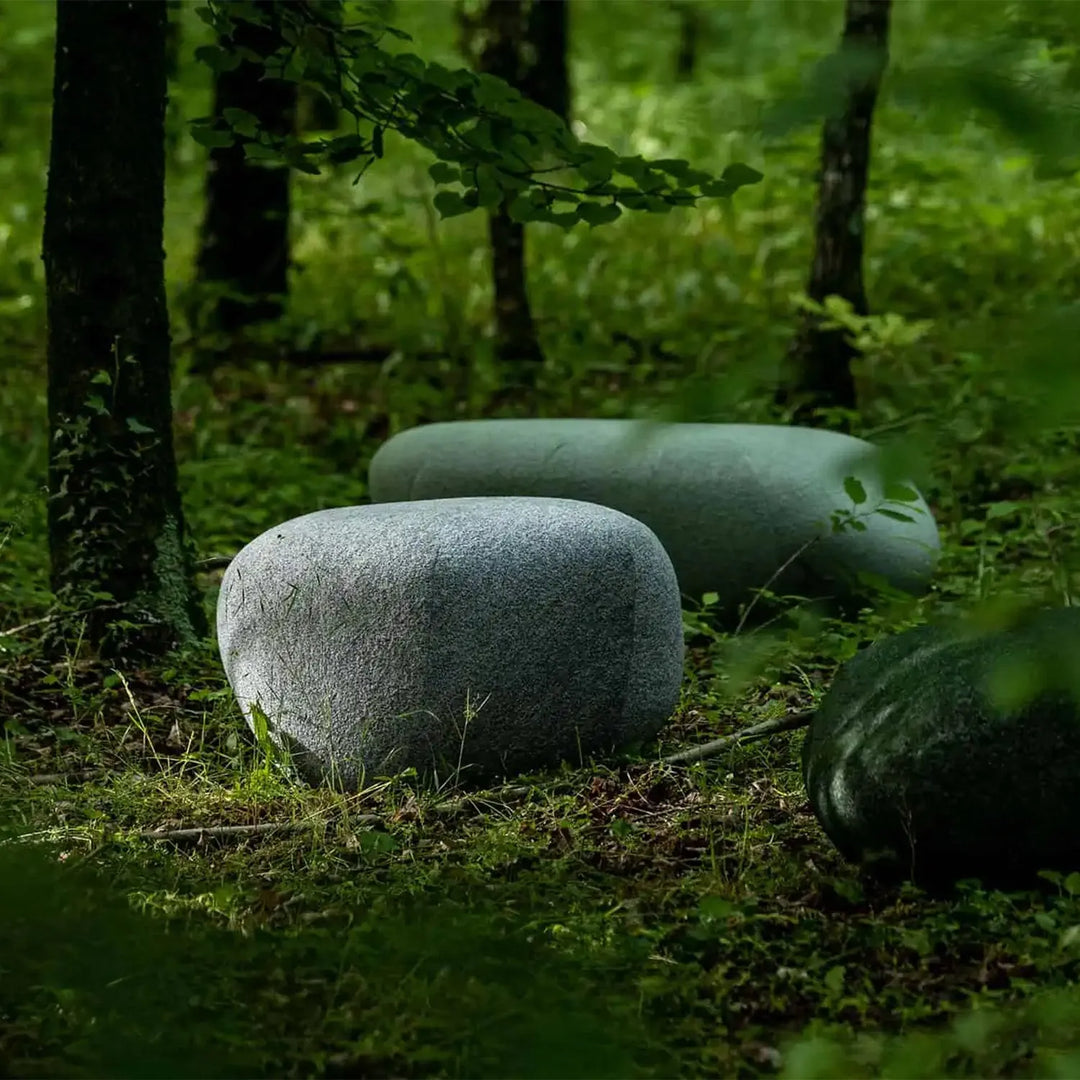 Contemporary fabric ottoman pebble primary product view.